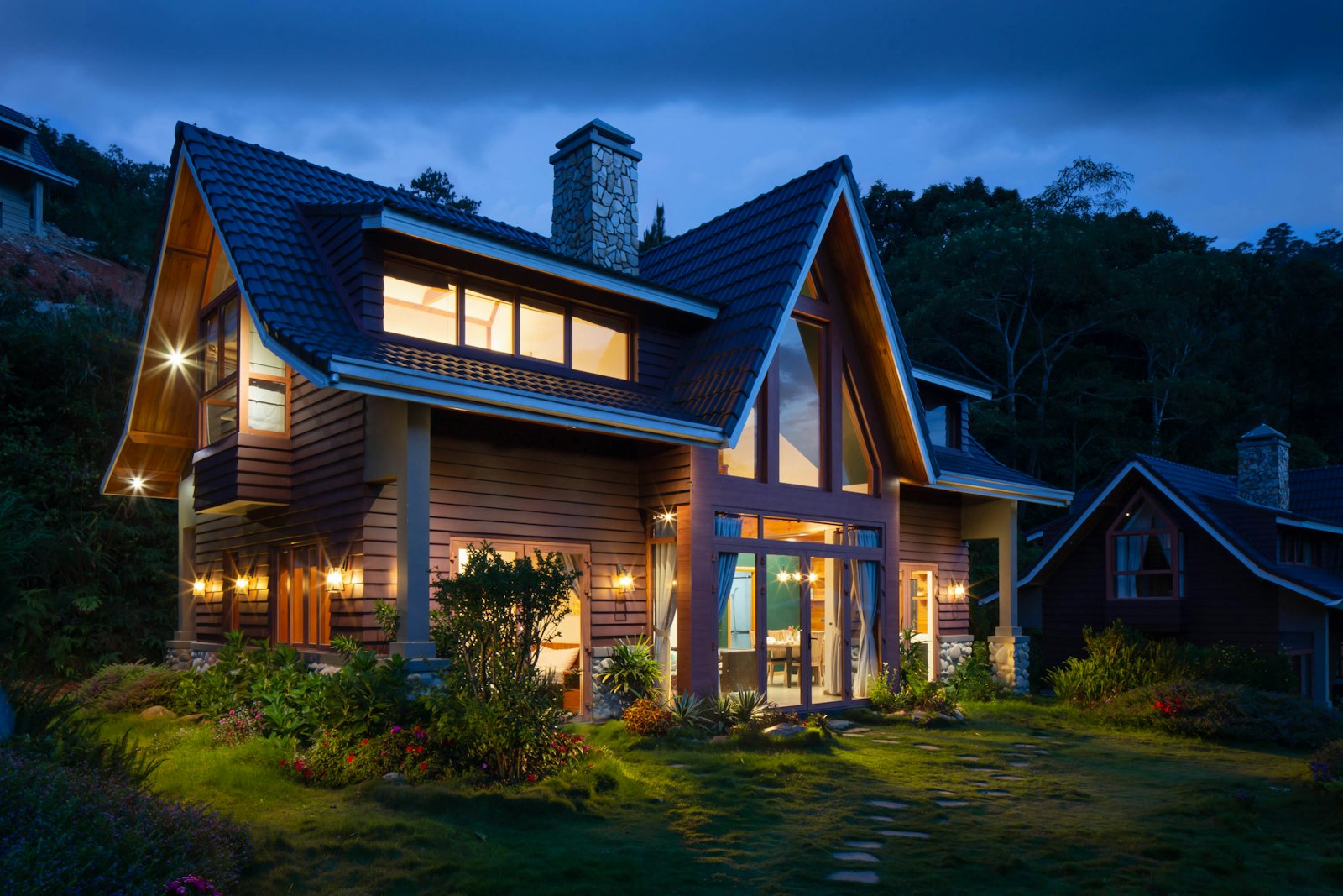 Warmly lit home at dusk